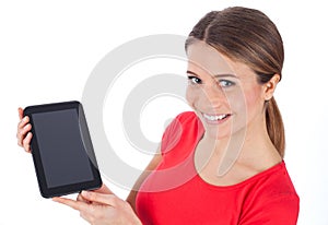 Smiling woman showing tablet pc