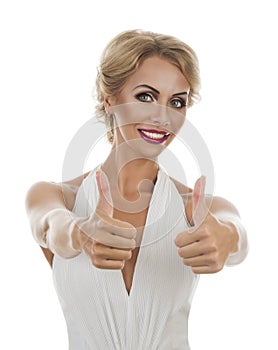 Smiling woman showing tumb sign