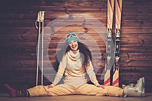Smiling woman with skis