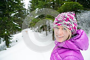 Smiling woman on snowy trails, Karkonosze Mountains, Poland