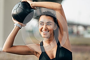 Smiling woman in sport clothes doing fitness