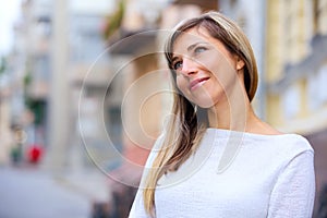 Smiling woman on the street