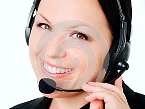 Smiling woman talking by headphone