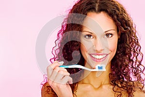 Smiling woman and teeth brush