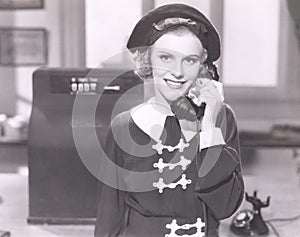 Smiling woman on the telephone