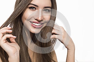 Smiling woman touching her hair