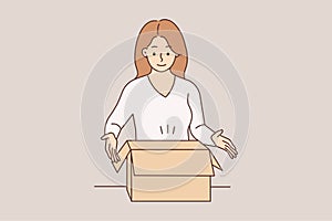 Smiling woman unpack box with order