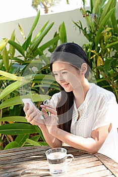 Woman looking at smart phone