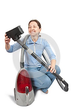 Smiling Woman vacuuming