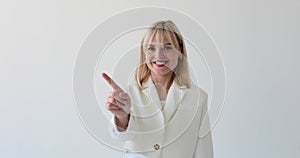 Smiling Woman Wagging Finger on White Background