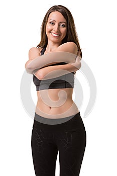 Smiling woman warming up her body.