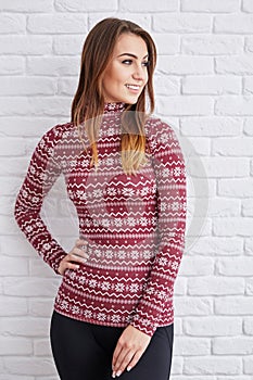 Smiling woman wearing warm sweater photo
