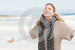 Smiling woman wearing winter clothing