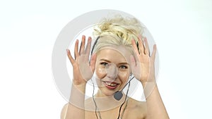 smiling woman working in a call center. Headset telemarketing woman talking on helpline. slow motion