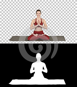 Smiling woman yoga meditating sitting lotus, hands coupled, Alpha Channel