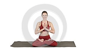 Smiling woman yoga meditating sitting lotus, hands coupled on white background.