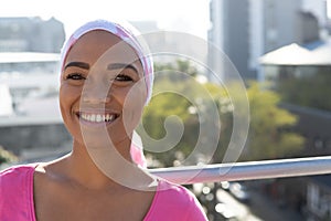 Smiling women wearing mantra scarf