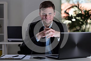 Smiling worker of corporation photo