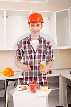 Smiling worker dines in the interior