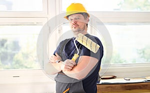 Smiling worker hold brush portrait