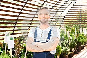 Smiling Worker Posing in Garden
