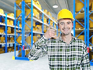 Smiling worker in warehouse