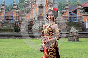 Smiling Young Balinese Girl in Temple