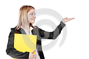 Smiling young blonde business woman holding yellow file while sh