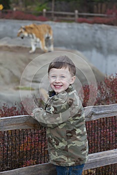 Smiling Young Boy at the Zoo