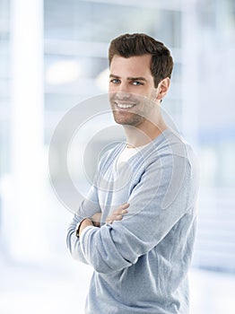 Smiling young businessman in casual