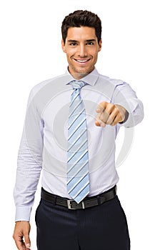 Smiling Young Businessman Pointing At You