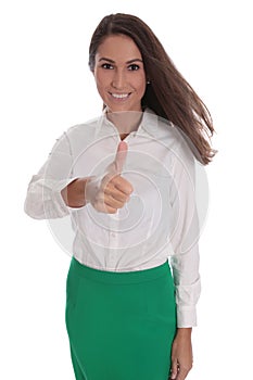 Smiling young businesswoman isolated over white with green skirt