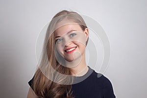 Smiling young caucasian girl woman, looking happy and positive