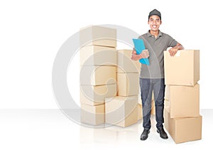 Smiling young delivery man with cardbox package