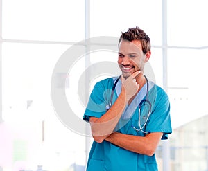 Smiling young doctor isolated in hospital