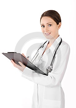 Smiling young doctor woman with plane table isolated