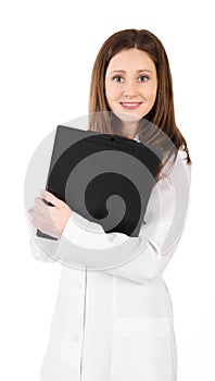 Smiling young doctor woman with a stethoscope and plane table is