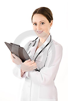 Smiling young doctor woman with a stethoscope and plane table is