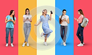 Smiling young european women in casual, headphones typing on smartphone, isolated on colorful background