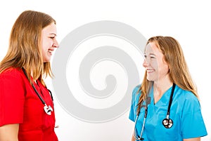 Smiling young female doctors