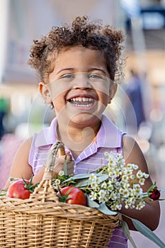 Smiling Young Girl at Farmers Market