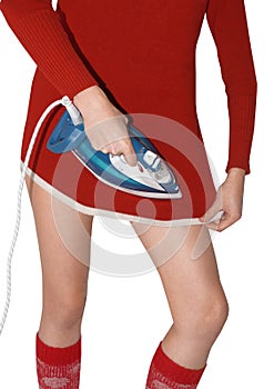 Smiling young girl ironing with iron isolated