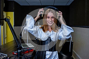 Smiling young girl listening to music