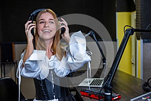 Smiling young girl listening to music