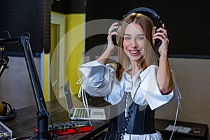 Smiling young girl listening to music