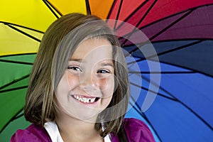 Smiling young girl with missing tooth