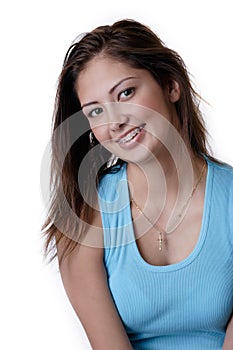 Smiling young girl wearing dental braces