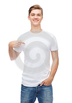 Smiling young man in blank white t-shirt