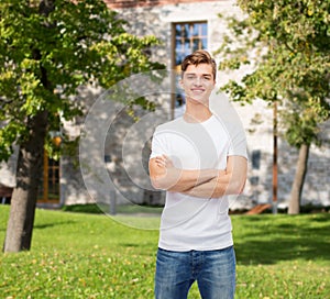 Smiling young man in blank white t-shirt