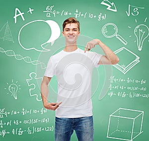 Smiling young man in blank white t-shirt